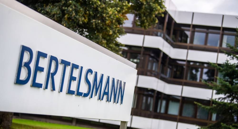 Du papier à l’intelligence artificielle : Bertelsmann s’associe à OpenAI pour l’avenir